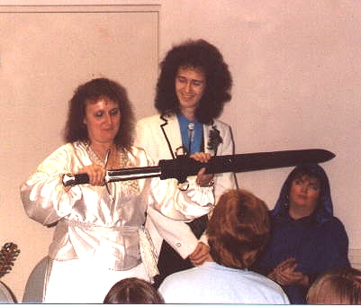 Misty, Larry and Need at Dreamcon 6 in Everett, Washington.  See the QO newsletter for November 1991 for coverage of the event.
